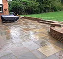 stone patio and turf lawn